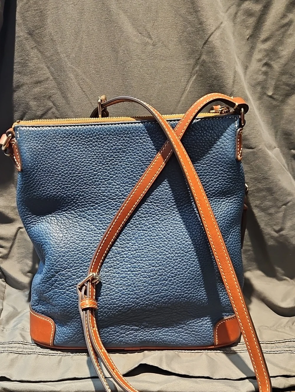 Dooney & Bourke Blue Pebble Leather Crossbody Bag with Brown Trim